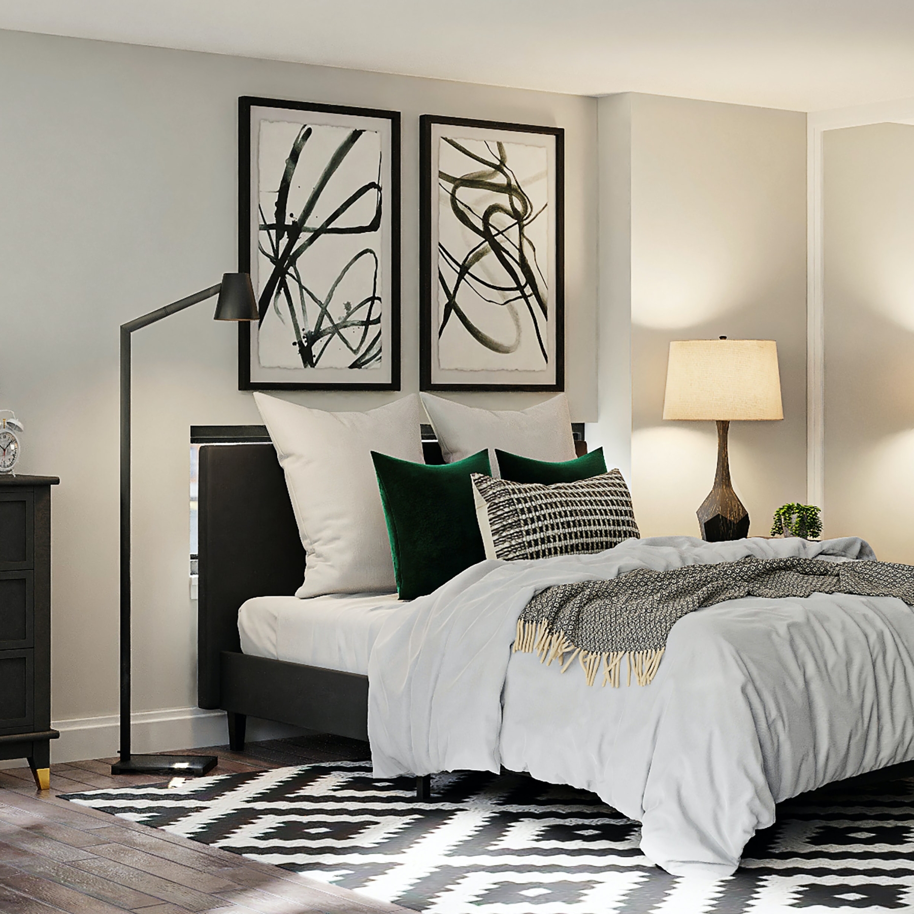 Bedroom with wood floor, geometric rug, large bed, floorstanding lamp, and artwork.