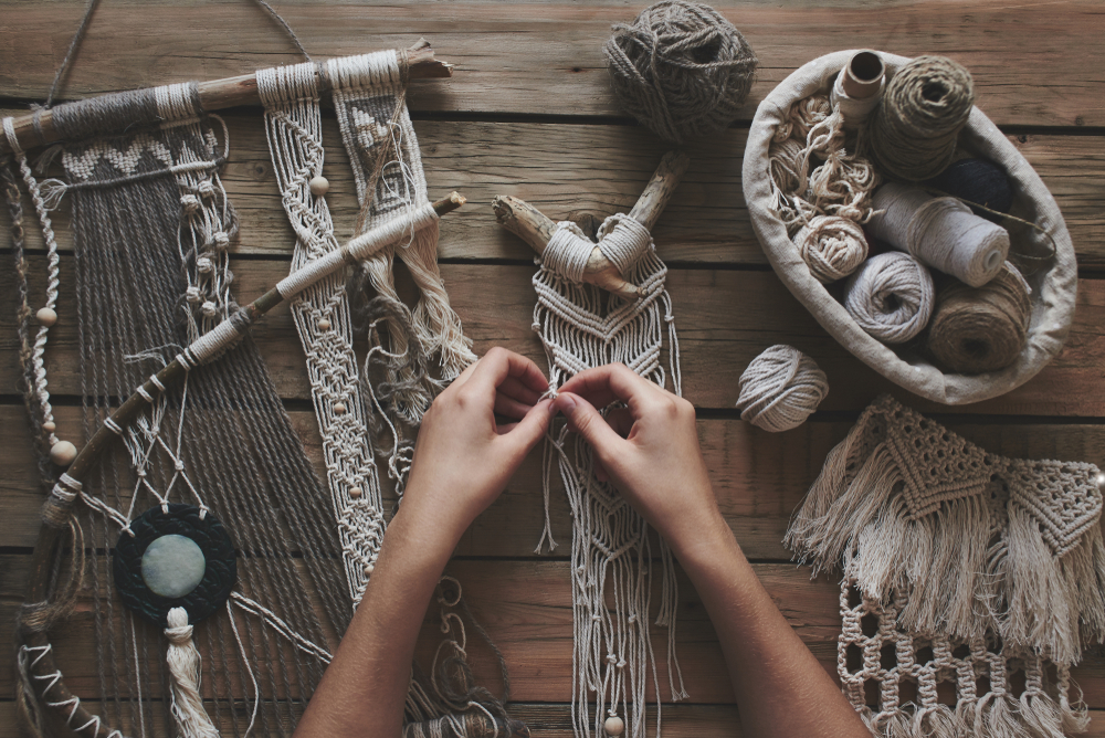 Female,Hobby.,Hands,Weaving,Macrame,On,A,Wooden,Table.,Do