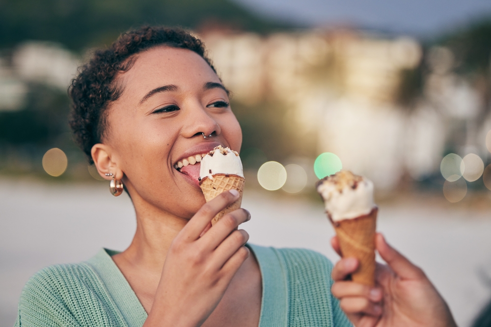 Woman,,Eating,Ice,Cream,And,Beach,With,Smile,,Thinking,And